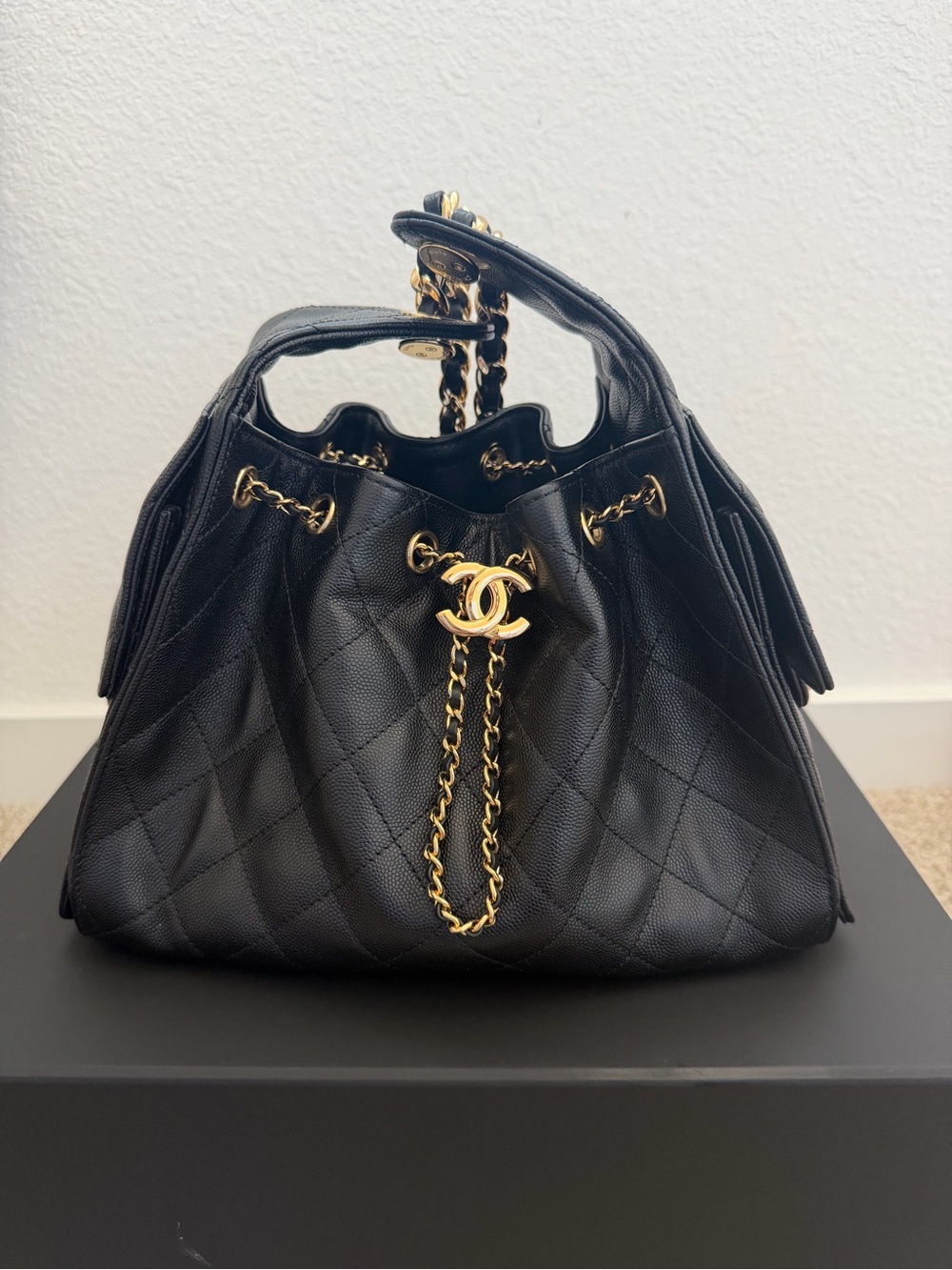 CHANEL Black Quilted Drawstring Bucket Bag with Gold Hardware